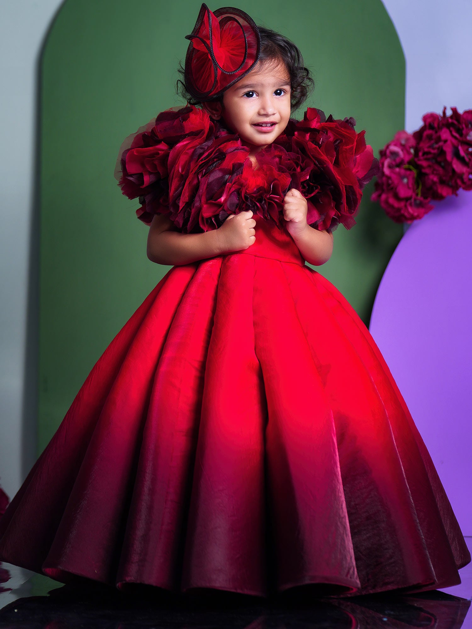 Shaded Red Couture Gown With Hair Accessory