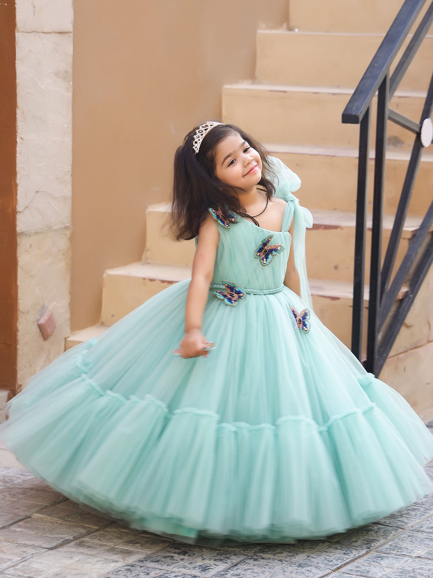 Green Marissa Princess Gown with hair accessory