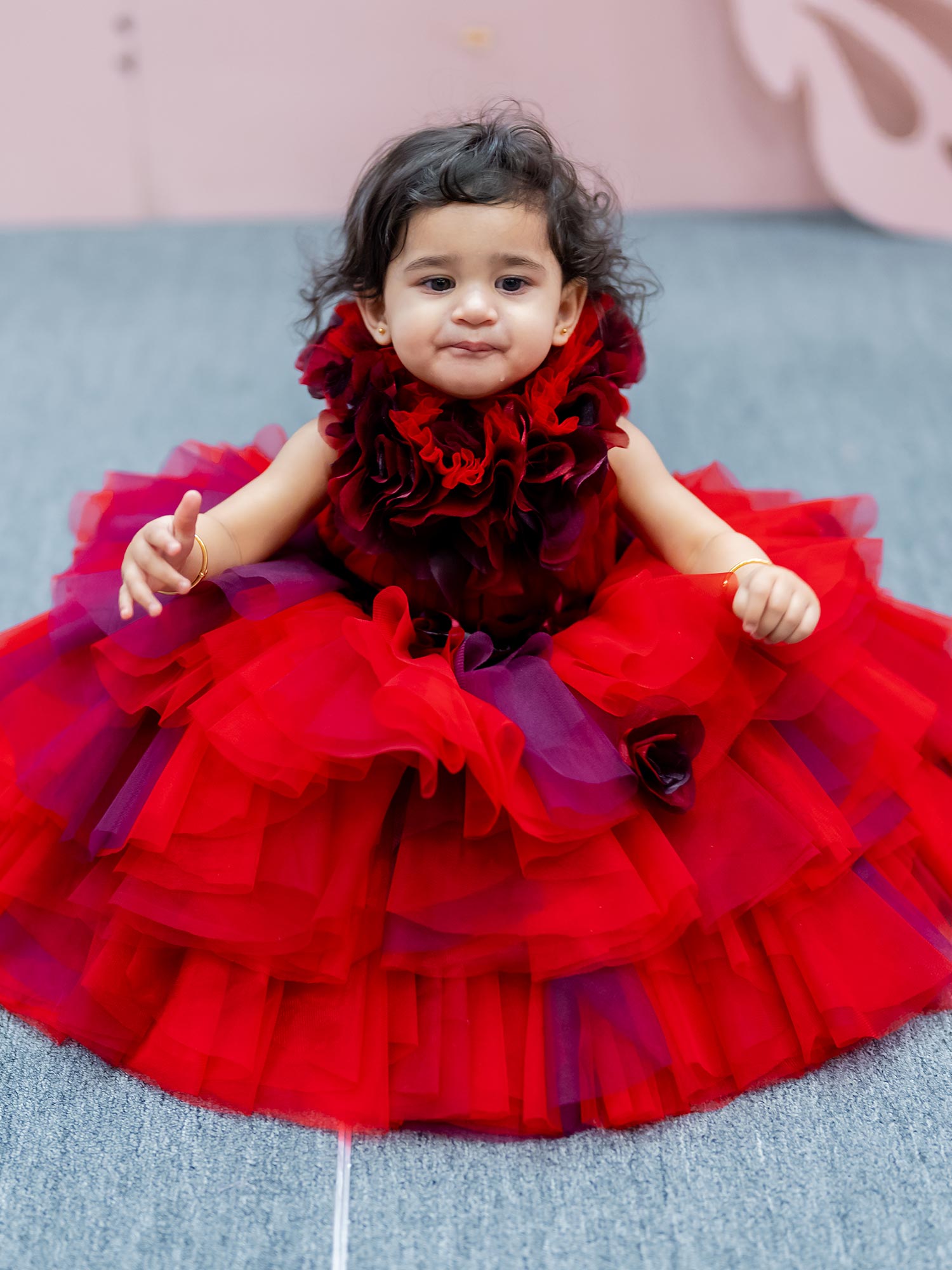 Pre Order :  Baby Red Hankies Shaded Drapes Gown With Hair Accessory